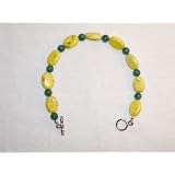 8 & 1/4 Bracelet with 14x12mm Yellow Turquoise & 6mm Dark Green Avertine Strung on 7 Strand Beading Wire Finished with Sterling Silver Crimps & Covers and a 10mm Antiqued Pewter Toggle Clasp