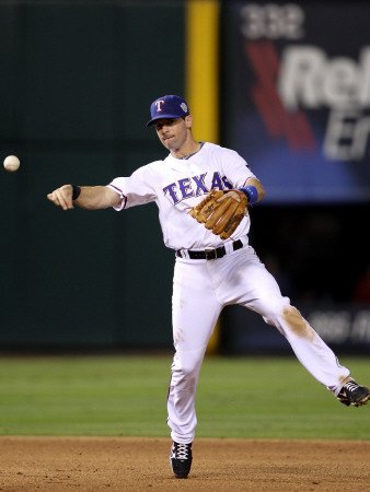 San Francisco Giants v Texas Rangers, Game 4: Michael Young Photographic Poster Print by Christian Petersen, 9x12
