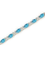 14kt Yellow Gold Oval Blue Topaz Bracelet.