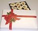 Scott's Cakes 1 lb. White Chocolate Almond Clusters in a Ribbon n Holly Box