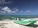 Boat and Turquoise Water on Pillory Beach, Turks and Caicos, Caribbean Photographic Poster Print by Walter Bibikow, 24x32
