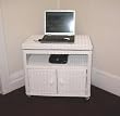 Elana wicker swivel tv stand with doors