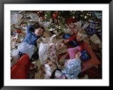 Children Laugh as They Lay in Wrapping Paper from Christmas Presents Photography Framed Art Poster Print by Joel Sartore, 49x39