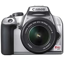 Canon Rebel XS 10.1MP Digital SLR Camera with EF-S 18-55mm f/3.5-5.6 IS Lens (Silver)