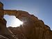 Sun's Rays, Natural Rock Arch, Desert Scenery, Wadi Rum, Jordan, Middle East Photographic Poster Print by Christian Kober, 24x18