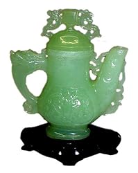 Genuine hand carved jade teapot, fitted wood stand included