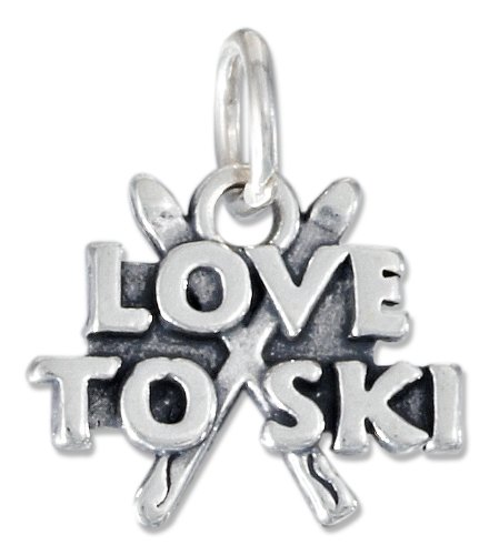 STERLING SILVER ANTIQUED SKIS AND 