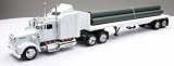 Kenworth W900 Flatbed Truck With Long Pipe