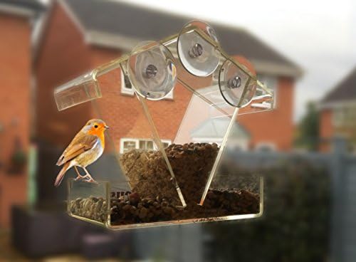Acrylic Window Bird Feeder. Sliding Roof. View All Birds From Inside Your House. Super Strong Suction Cup Design Secures the Bird House on the Window. Fun for All the Family, Especially the Kids. 100% Money Back Guarantee. Order Now!