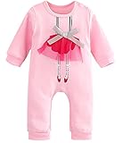 女の赤ちゃんのの睡眠とロンパース新生児のワンピースのスーツをプレイ