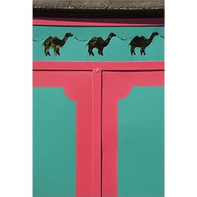 photographie Camel cut-outs on pink and turquoise metal door of local house. est disperible en (L...