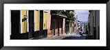 Car Moving on a Street, Calle Del Cristo, Old San Juan, Puerto Rico Framed Art Poster Print by Panoramic Images , 51x23