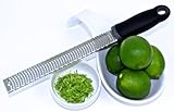 Best Premium Zester Grater - Versatile Tool is Ideal for Cheese, all Citrus Fruits, Chocolate, Cinnamon & Spices, and much more! Create Citrus Zest in Seconds and Effortlessly Grate Even the Hardest Cheese! Sharp Stainless Steel Blade, Non-Slip Handle, Dishwasher Safe. FREE Protective Cover and Downloadable Cookbook with Purchase. Perfect for your own kitchen or as a thoughtful gift!