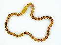 AmberBaby - Collier d'ambre enfants - Perles Boules - 32 cm - Miel