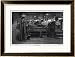 Men Working at Printing Presses Under the Glare of Electric Light Framed Art Poster Print by Susan Varley, 31x24