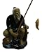 Chinese fisherman with fishing pole - cobalt blue shirt, hand glazed ceramic