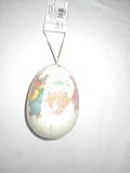 Cream Colored Easter Egg with Rabbits Going Around It with Ribbon Hanger