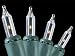 Set of 140 Clear Everglow Chasing Mini Christmas Lights - Green Wire