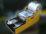 Delta300: semi-automatic overwrapping machine for CD and DVD cases Novak Automation Wrapper