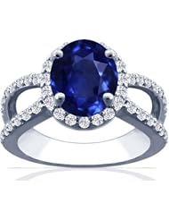 Platinum Oval Cut Blue Sapphire Ring With Sidestones