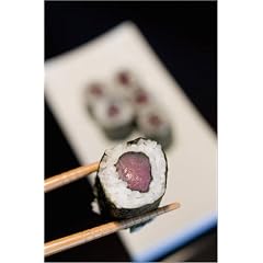 Poster 70 x 110 cm - "Pair of chopsticks clutching tuna fish makizushi over a plate at Tako Japanses sushi restaurant, Edi" von Paul Bernhardt / Lonely Planet Images - auch in anderen Gr��en und als Leinwandbild erh�ltlich