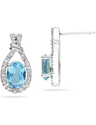 Blue Topaz & Diamonds Oval Shape Earrings in White Gold