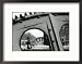 A Cyclist Passes a Draw Bridge as Snow Covers the City Center of Amsterdam Framed Photographic Poster Print, 21x17