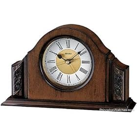 Click here to buy Seiko Small Desk or Table Alarm Clock - Brown Alder Case - Carved Detail.
