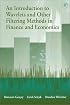 An Introduction to Wavelets and Other Filtering Methods in Finance and Economics