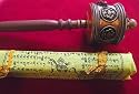 Tibetan Buddhist Prayer Wheel in Copper & Brass (Overall length 26,5cms) with Tibetan Prayer Flag Set - String of 25 Flags Overall length approx 600cms; each Flag approx 24cms by18cms - Sold by Spiritual Gifts. Usually dispatched within 2 working days.