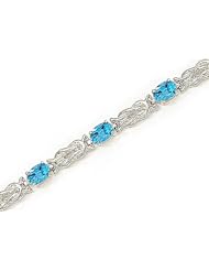 14kt Yellow Gold Oval Blue Topaz Bracelet.