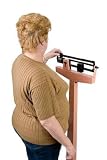 Over the Shoulder Look at a Woman Checking Her Weight - 36