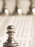 Silver Pawn on Newspaper Stock Market Report with Line of Chess Pieces Sports Photographic Poster Print, 18x24