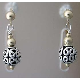 Click here to buy Gold and Sterling Silver Earrings by Peace Unique.