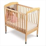 Compact Sized Crib with Mirror and 3 inch Mattress Natural