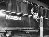 Couriers Dig Ficken and Bill Croasdale Putting Diplomatic Sacks Aboard the Train Collections Photographic Poster Print, 18x24