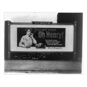 Historic Print (S): [Billboard illustration showing a woman eating an Oh Henry candy bar]
