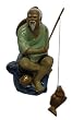 Chinese fisherman, sitting with fishing pole - light green outfit, hand glazed ceramic Chinese fisherman, sitting with fishing pole - light green outfit, hand glazed ceramic