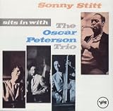 Sits in with the Oscar Peterson Trio