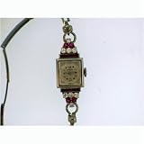 Vintage Antique watch: Ladies Omega Platinum Watch Set with High-Quality Diamonds and Rubies... by Swiss