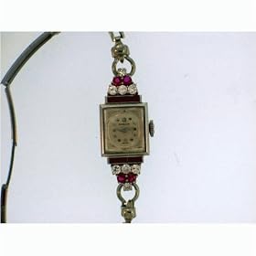 Click here to buy Vintage Antique watch: Ladies Omega Platinum Watch Set with High-Quality Diamonds and Rubies... by Swiss.
