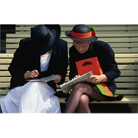 photographie Visitors to Ladies Day (or Oaks Day) check out the formguide at Melbourne's Spring R...