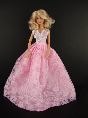 A Beautiful Pink Ball Gown with a White Lace Butterfly on the Botice Made to Fit the Barbie Doll