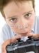 Wallmonkeys Peel and Stick Wall Decals - Young Boy Using Videogame Controller and Concentrating - Removable Graphic