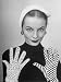 Model Martha Boss, Modeling Mismatched Gloves Photographic Poster Print by Nina Leen,...