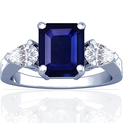 Platinum Emerald Cut Blue Sapphire Three Stone Ring