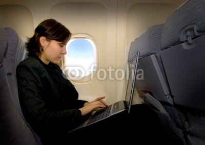 Wallmonkeys Peel and Stick Wall Decals - Business Woman Using Laptop during the Flight - 24W x 17H Removable Graphic