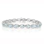10k White Gold Oval Cut Blue Topaz Bracelet, 7"