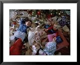 Children Laugh as They Lay in Wrapping Paper from Christmas Presents Framed Art Poster Print by Joel Sartore, 31x25
