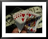 Hand Holding a Straight Flush in Front of Several Hundred Dollar Bills Sports Framed Photographic Poster Print, 31x25
